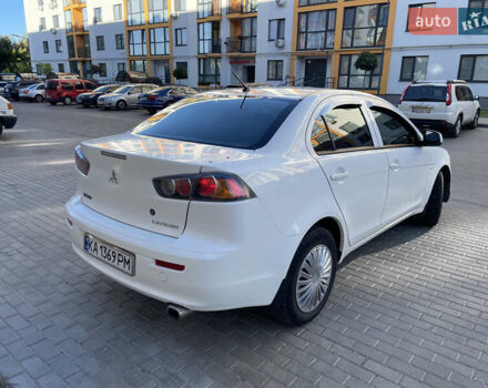 Білий Міцубісі Lancer, об'ємом двигуна 1.6 л та пробігом 205 тис. км за 4750 $, фото 4 на Automoto.ua