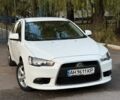 Белый Мицубиси Лансер, объемом двигателя 1.6 л и пробегом 62 тыс. км за 7500 $, фото 1 на Automoto.ua