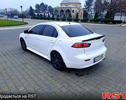 Белый Мицубиси Лансер, объемом двигателя 2 л и пробегом 188 тыс. км за 7700 $, фото 2 на Automoto.ua