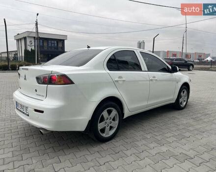 Белый Мицубиси Лансер, объемом двигателя 1.59 л и пробегом 145 тыс. км за 7500 $, фото 1 на Automoto.ua