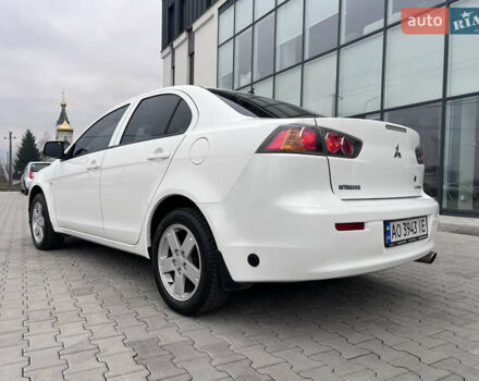 Белый Мицубиси Лансер, объемом двигателя 1.59 л и пробегом 145 тыс. км за 7500 $, фото 3 на Automoto.ua