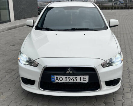 Белый Мицубиси Лансер, объемом двигателя 1.59 л и пробегом 145 тыс. км за 7500 $, фото 6 на Automoto.ua