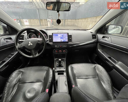 Білий Міцубісі Lancer, об'ємом двигуна 1.6 л та пробігом 231 тис. км за 6900 $, фото 4 на Automoto.ua