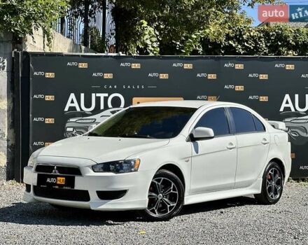 Белый Мицубиси Лансер, объемом двигателя 2 л и пробегом 124 тыс. км за 7700 $, фото 2 на Automoto.ua