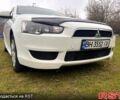 Білий Міцубісі Lancer, об'ємом двигуна 2 л та пробігом 130 тис. км за 6800 $, фото 1 на Automoto.ua