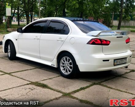 Білий Міцубісі Lancer, об'ємом двигуна 1.8 л та пробігом 169 тис. км за 8999 $, фото 6 на Automoto.ua