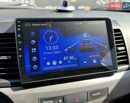 Белый Мицубиси Лансер, объемом двигателя 2 л и пробегом 124 тыс. км за 7700 $, фото 15 на Automoto.ua