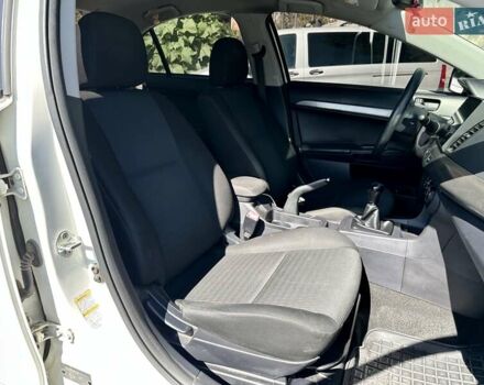 Белый Мицубиси Лансер, объемом двигателя 2 л и пробегом 124 тыс. км за 7700 $, фото 9 на Automoto.ua