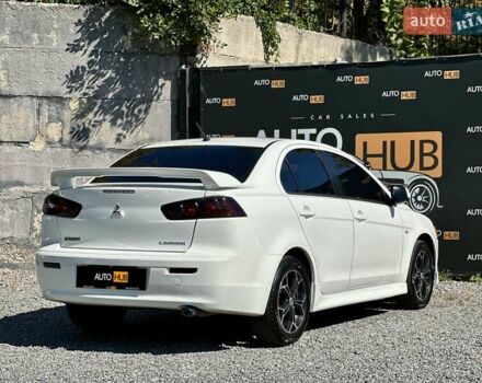 Белый Мицубиси Лансер, объемом двигателя 2 л и пробегом 124 тыс. км за 7700 $, фото 5 на Automoto.ua