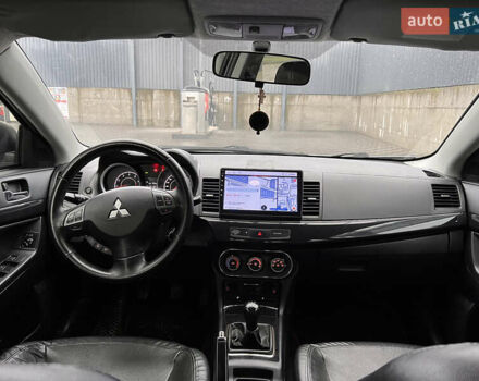 Білий Міцубісі Lancer, об'ємом двигуна 1.6 л та пробігом 231 тис. км за 6900 $, фото 6 на Automoto.ua