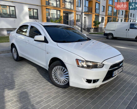 Білий Міцубісі Lancer, об'ємом двигуна 1.6 л та пробігом 205 тис. км за 4750 $, фото 2 на Automoto.ua