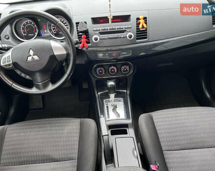 Белый Мицубиси Лансер, объемом двигателя 1.59 л и пробегом 145 тыс. км за 7500 $, фото 20 на Automoto.ua