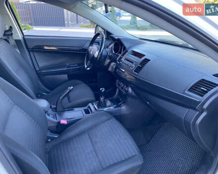 Білий Міцубісі Lancer, об'ємом двигуна 1.6 л та пробігом 205 тис. км за 4750 $, фото 26 на Automoto.ua