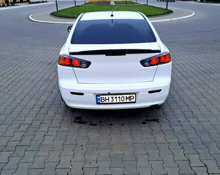 Белый Мицубиси Лансер, объемом двигателя 2 л и пробегом 188 тыс. км за 7700 $, фото 1 на Automoto.ua