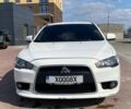Белый Мицубиси Лансер, объемом двигателя 1.6 л и пробегом 214 тыс. км за 6850 $, фото 1 на Automoto.ua