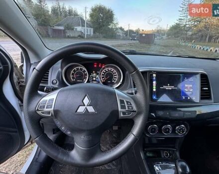 Білий Міцубісі Lancer, об'ємом двигуна 1.6 л та пробігом 180 тис. км за 7500 $, фото 8 на Automoto.ua