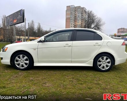 Білий Міцубісі Lancer, об'ємом двигуна 2 л та пробігом 130 тис. км за 6800 $, фото 4 на Automoto.ua