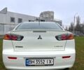 Білий Міцубісі Lancer, об'ємом двигуна 2 л та пробігом 130 тис. км за 6800 $, фото 5 на Automoto.ua