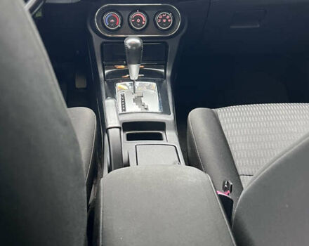 Белый Мицубиси Лансер, объемом двигателя 1.59 л и пробегом 145 тыс. км за 7500 $, фото 21 на Automoto.ua