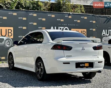Белый Мицубиси Лансер, объемом двигателя 2 л и пробегом 124 тыс. км за 7700 $, фото 3 на Automoto.ua