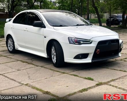 Білий Міцубісі Lancer, об'ємом двигуна 1.8 л та пробігом 169 тис. км за 8999 $, фото 2 на Automoto.ua