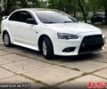 Білий Міцубісі Lancer, об'ємом двигуна 1.8 л та пробігом 169 тис. км за 8999 $, фото 2 на Automoto.ua