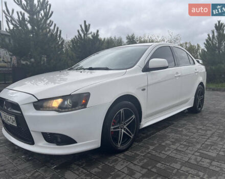 Білий Міцубісі Lancer, об'ємом двигуна 1.6 л та пробігом 231 тис. км за 6900 $, фото 9 на Automoto.ua