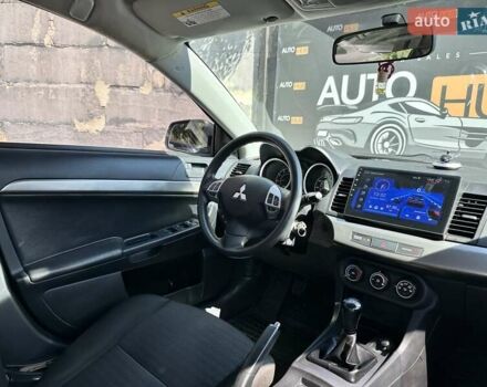 Белый Мицубиси Лансер, объемом двигателя 2 л и пробегом 124 тыс. км за 7700 $, фото 10 на Automoto.ua