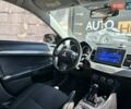 Белый Мицубиси Лансер, объемом двигателя 2 л и пробегом 124 тыс. км за 7700 $, фото 10 на Automoto.ua