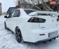 Білий Міцубісі Lancer, об'ємом двигуна 1.6 л та пробігом 230 тис. км за 6800 $, фото 1 на Automoto.ua