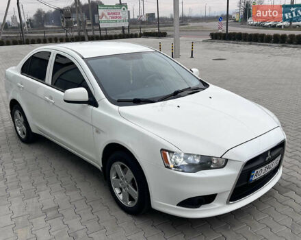 Белый Мицубиси Лансер, объемом двигателя 1.59 л и пробегом 145 тыс. км за 7500 $, фото 8 на Automoto.ua