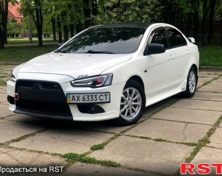 Білий Міцубісі Lancer, об'ємом двигуна 1.8 л та пробігом 169 тис. км за 8999 $, фото 3 на Automoto.ua