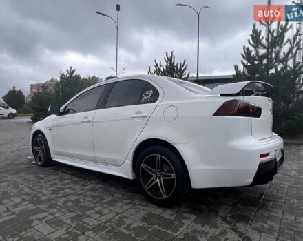 Білий Міцубісі Lancer, об'ємом двигуна 1.6 л та пробігом 231 тис. км за 6900 $, фото 7 на Automoto.ua