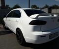 Білий Міцубісі Lancer, об'ємом двигуна 1.59 л та пробігом 182 тис. км за 6900 $, фото 1 на Automoto.ua