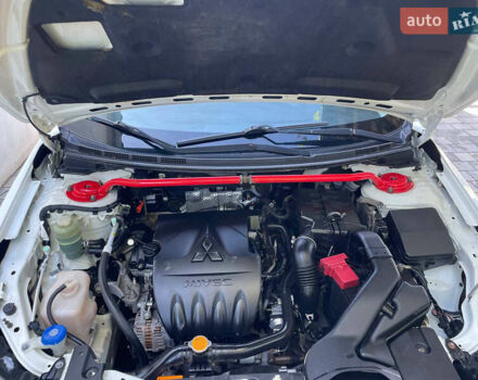 Білий Міцубісі Lancer, об'ємом двигуна 1.6 л та пробігом 205 тис. км за 4750 $, фото 31 на Automoto.ua