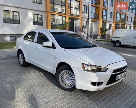 Білий Міцубісі Lancer, об'ємом двигуна 1.6 л та пробігом 205 тис. км за 4750 $, фото 1 на Automoto.ua