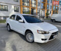 Білий Міцубісі Lancer, об'ємом двигуна 1.6 л та пробігом 205 тис. км за 4750 $, фото 1 на Automoto.ua