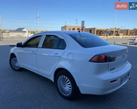 Білий Міцубісі Lancer, об'ємом двигуна 1.6 л та пробігом 205 тис. км за 4750 $, фото 13 на Automoto.ua