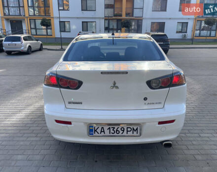 Білий Міцубісі Lancer, об'ємом двигуна 1.6 л та пробігом 205 тис. км за 4750 $, фото 6 на Automoto.ua