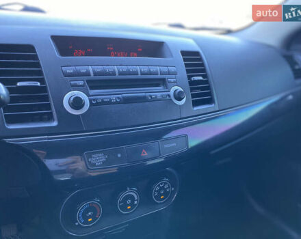 Білий Міцубісі Lancer, об'ємом двигуна 1.6 л та пробігом 205 тис. км за 4750 $, фото 23 на Automoto.ua