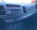 Білий Міцубісі Lancer, об'ємом двигуна 1.6 л та пробігом 205 тис. км за 4750 $, фото 23 на Automoto.ua