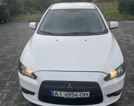 Білий Міцубісі Lancer, об'ємом двигуна 1.6 л та пробігом 231 тис. км за 6900 $, фото 2 на Automoto.ua