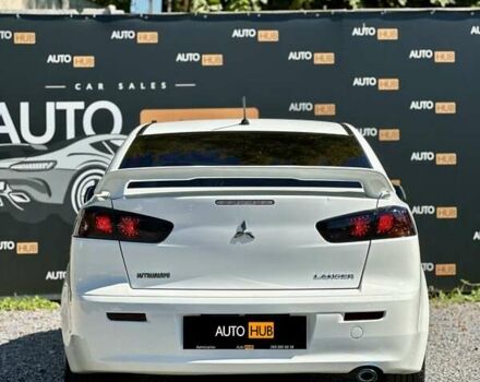 Белый Мицубиси Лансер, объемом двигателя 2 л и пробегом 124 тыс. км за 7700 $, фото 4 на Automoto.ua