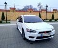 Белый Мицубиси Лансер, объемом двигателя 2 л и пробегом 188 тыс. км за 7700 $, фото 1 на Automoto.ua
