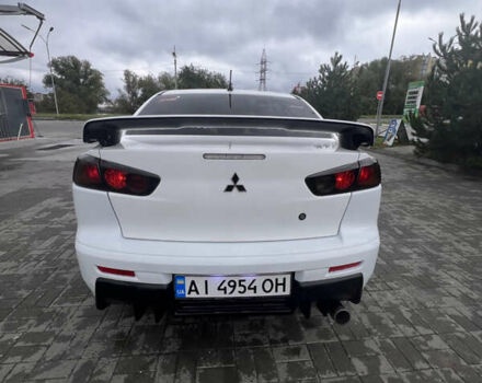 Білий Міцубісі Lancer, об'ємом двигуна 1.6 л та пробігом 231 тис. км за 6900 $, фото 1 на Automoto.ua