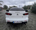 Білий Міцубісі Lancer, об'ємом двигуна 1.6 л та пробігом 231 тис. км за 6900 $, фото 1 на Automoto.ua