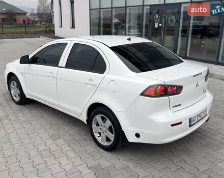 Белый Мицубиси Лансер, объемом двигателя 1.59 л и пробегом 145 тыс. км за 7500 $, фото 10 на Automoto.ua