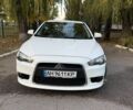 Белый Мицубиси Лансер, объемом двигателя 1.6 л и пробегом 62 тыс. км за 7500 $, фото 1 на Automoto.ua