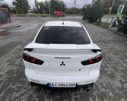 Білий Міцубісі Lancer, об'ємом двигуна 1.6 л та пробігом 231 тис. км за 6900 $, фото 11 на Automoto.ua