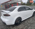 Білий Міцубісі Lancer, об'ємом двигуна 1.6 л та пробігом 231 тис. км за 6900 $, фото 8 на Automoto.ua